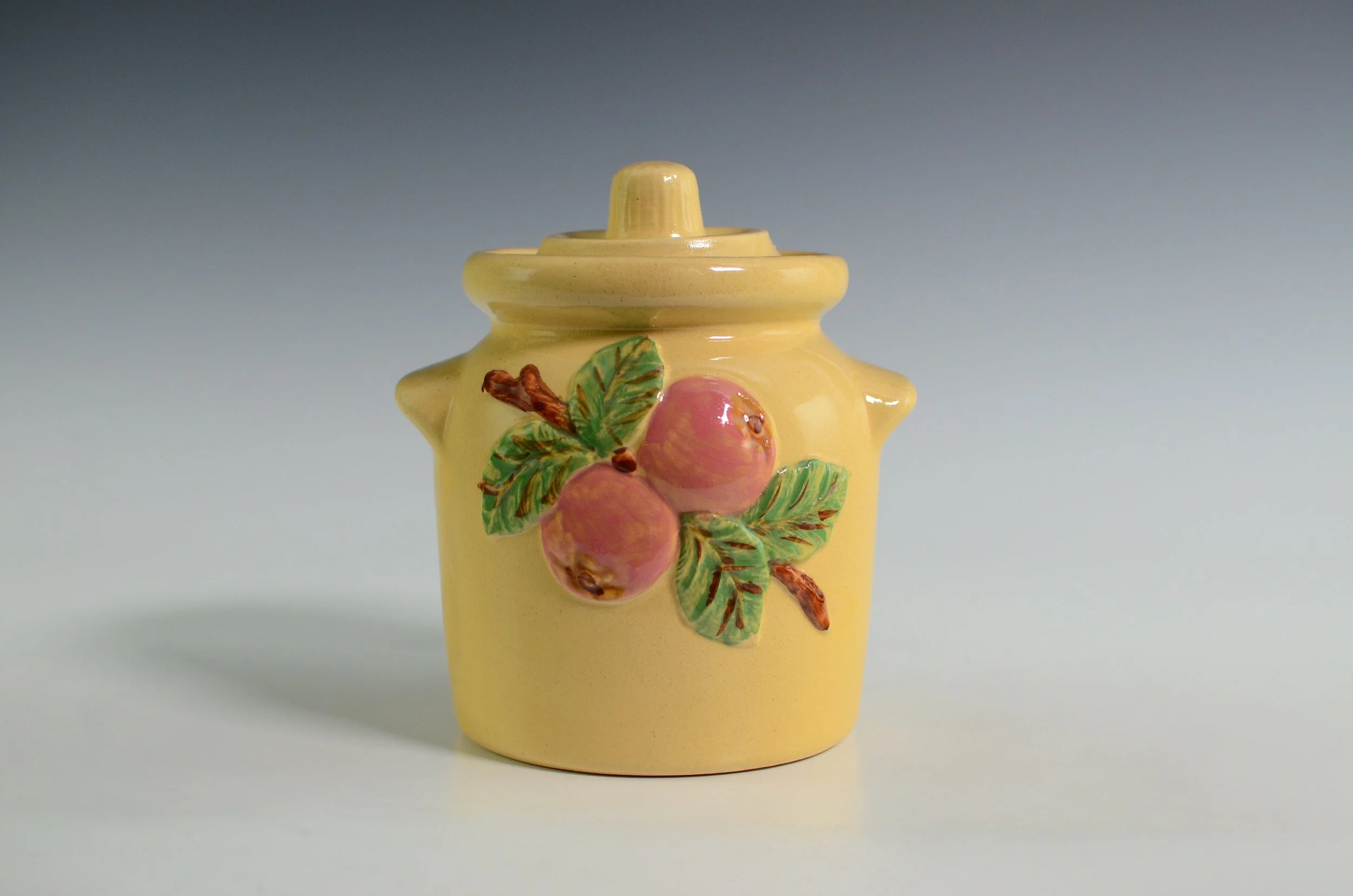 ZMA Puzzler! Cookie Jar with Low-relief Apple Decoration by the Robinson-Ransbottom Pottery Company