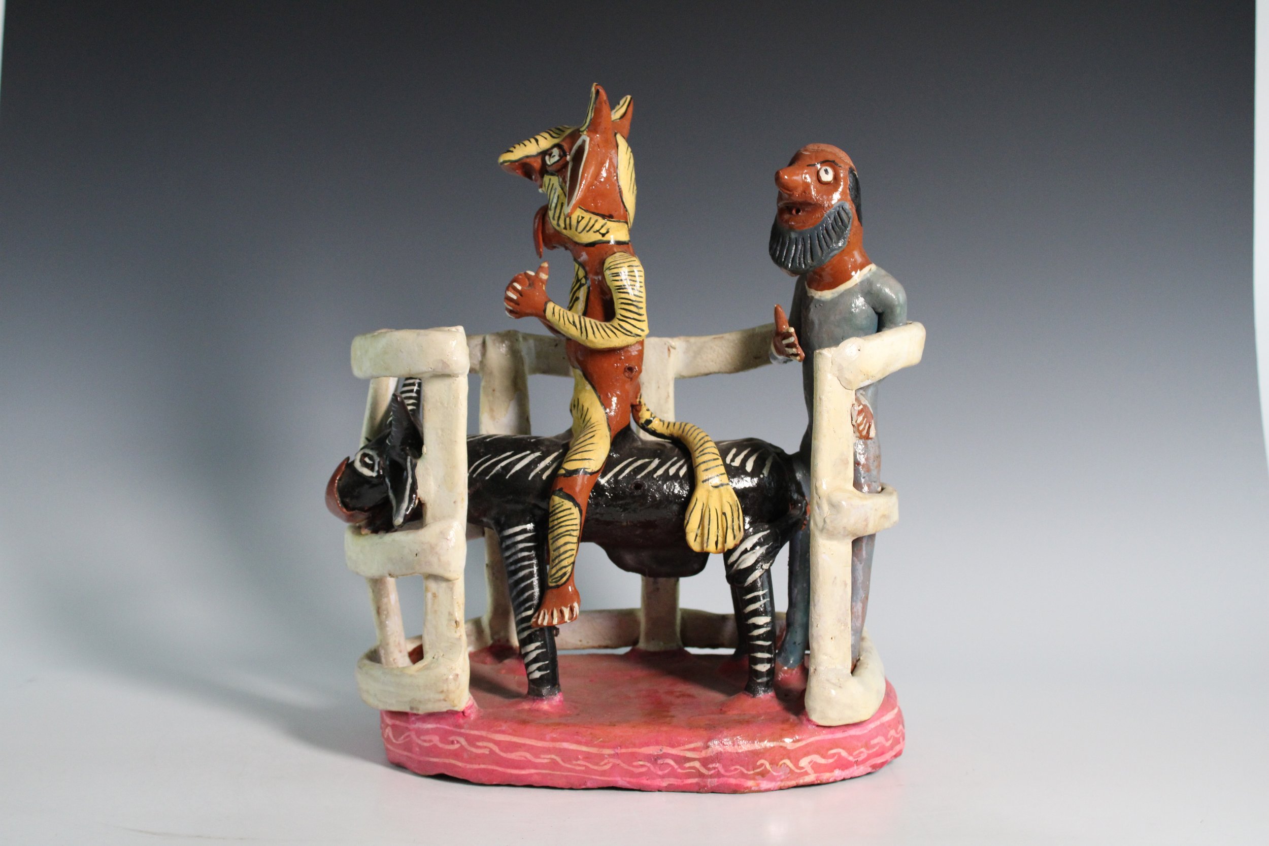 Mexican Folk Art Polychrome Earthenware Sculpture Featuring the Devil Riding a Bull, 20th Century