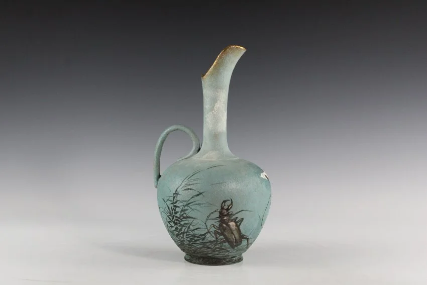 ZMA Puzzler! Dull Finish Pitcher Featuring Stag Beetles by the Rookwood Pottery Company decorated by Laura Ann Fry