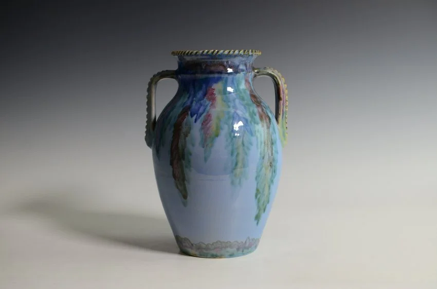 ZMA Puzzler! Juneau Variant Featuring a Blue Background and Multicolored Drip and Twist Decorations on Rim and Handles