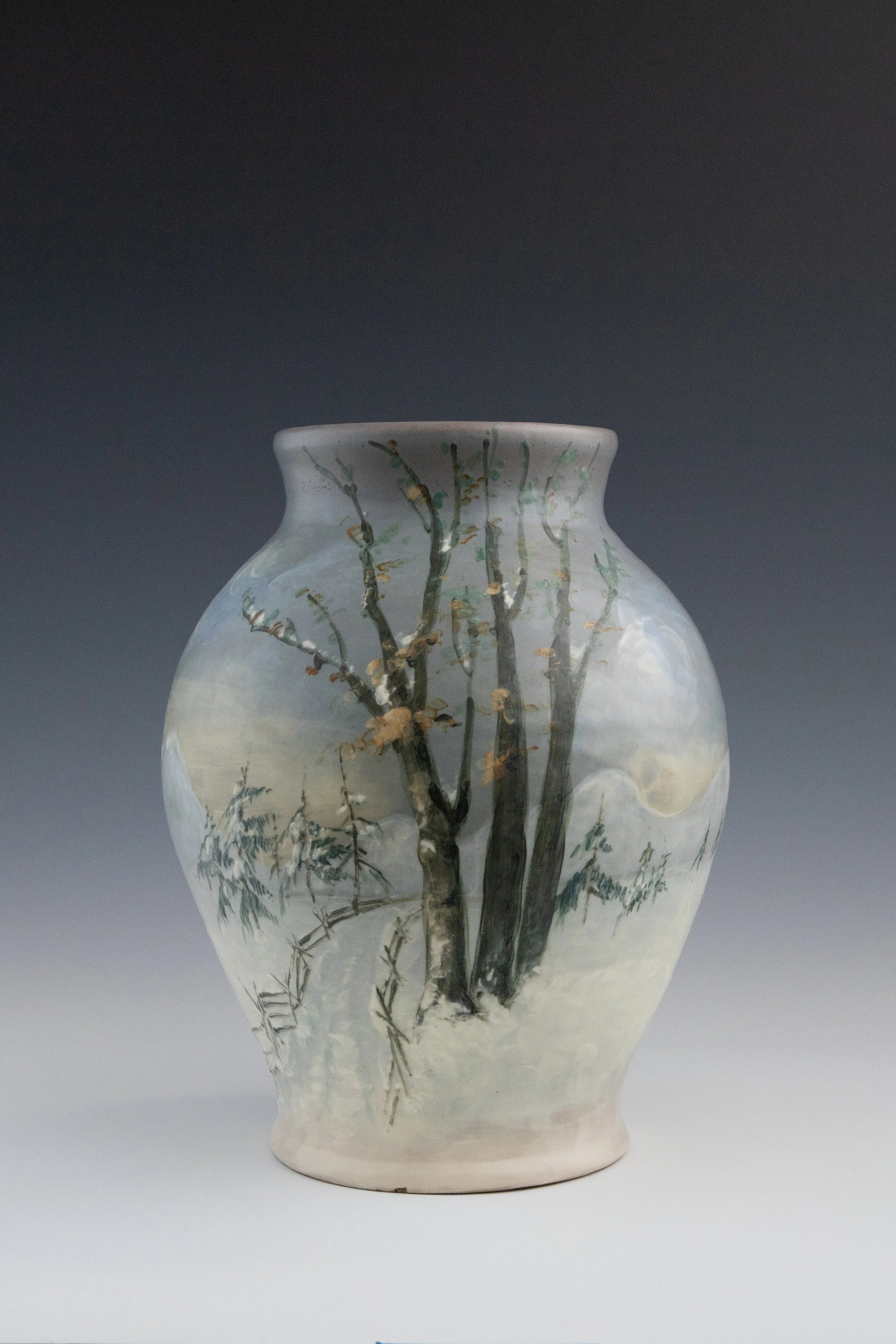 Weller Pottery Company, Hudson (Numbered Scenics) Line Vase #11 Featuring a Snow Scene, decorated by Sarah Reid McLaughlin (1885-1939), late 1920s, earthenware.