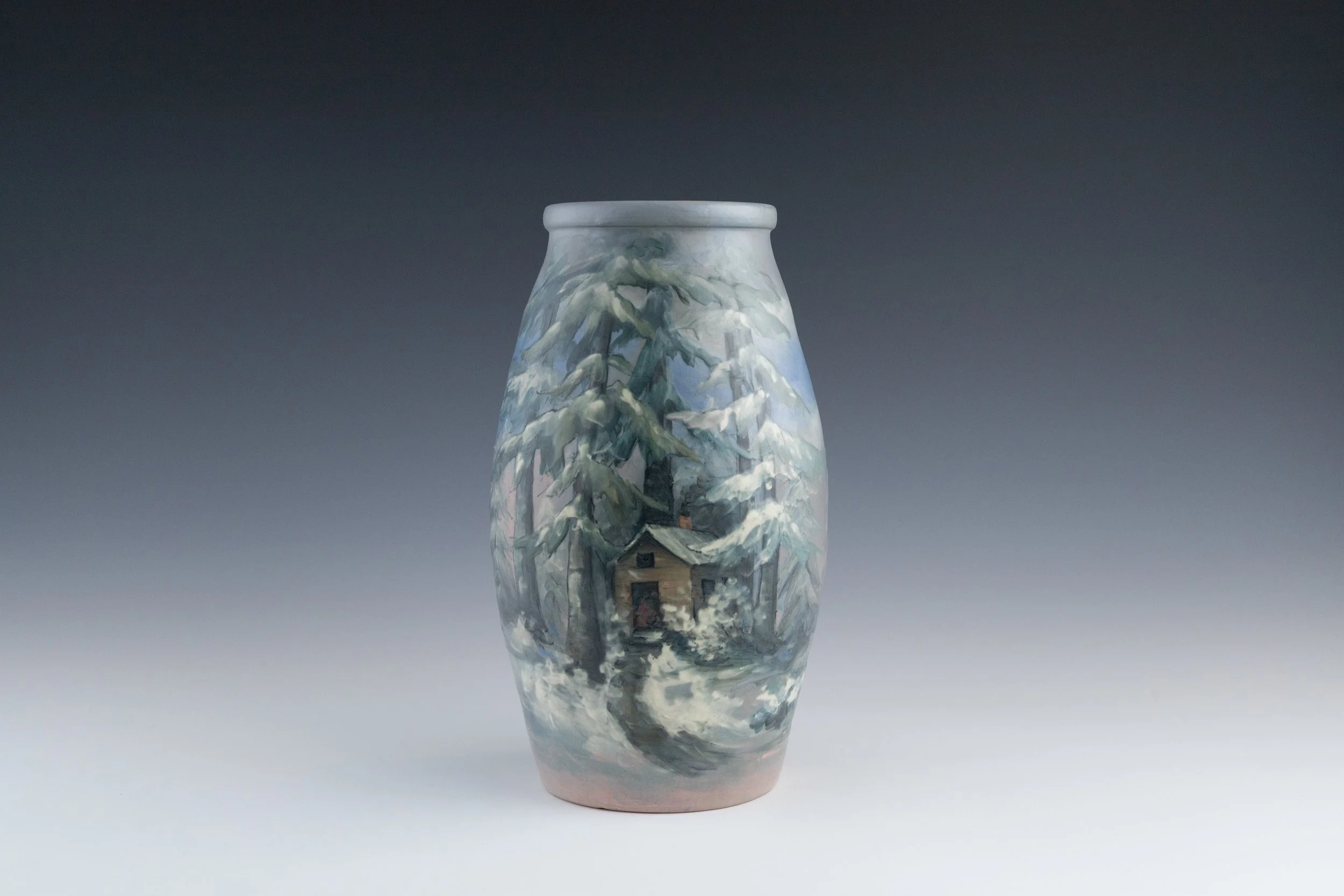 Weller Pottery Gallery, Hudson (Numbered Scenics) Line Vase #16 Featuring a Snowy Cabin in the Woods, decorated by Hester W. Pillsbury (1862-1951), late 1920s, earthenware.