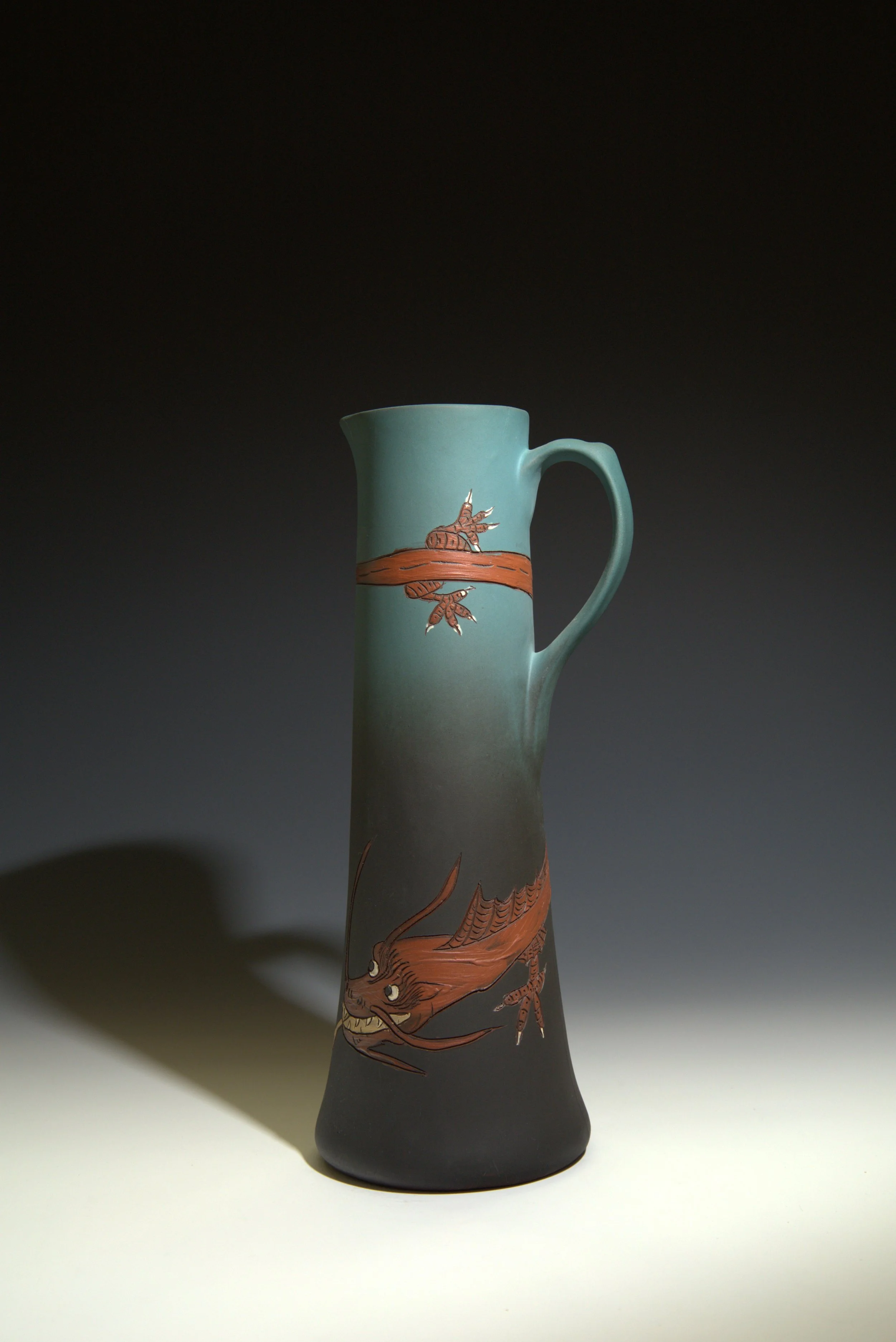 Weller Pottery Company, Dickens Ware II Line Pitcher Featuring a Dragon, circa 1900. 2024.026.001