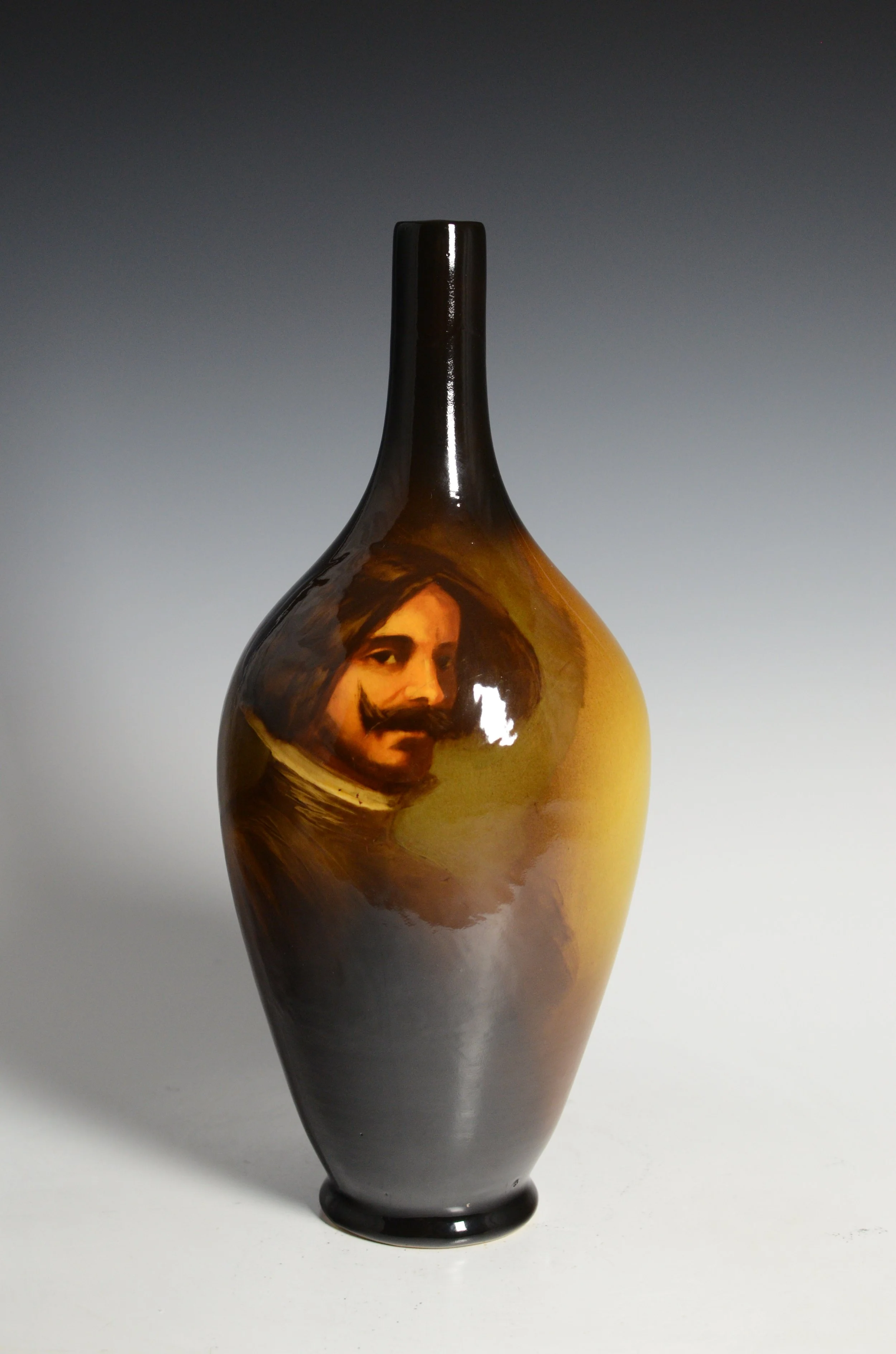 J. B. Owens Pottery Company (1885-1907). Utopian Vase in Brown with Portrait of a Cavalier.