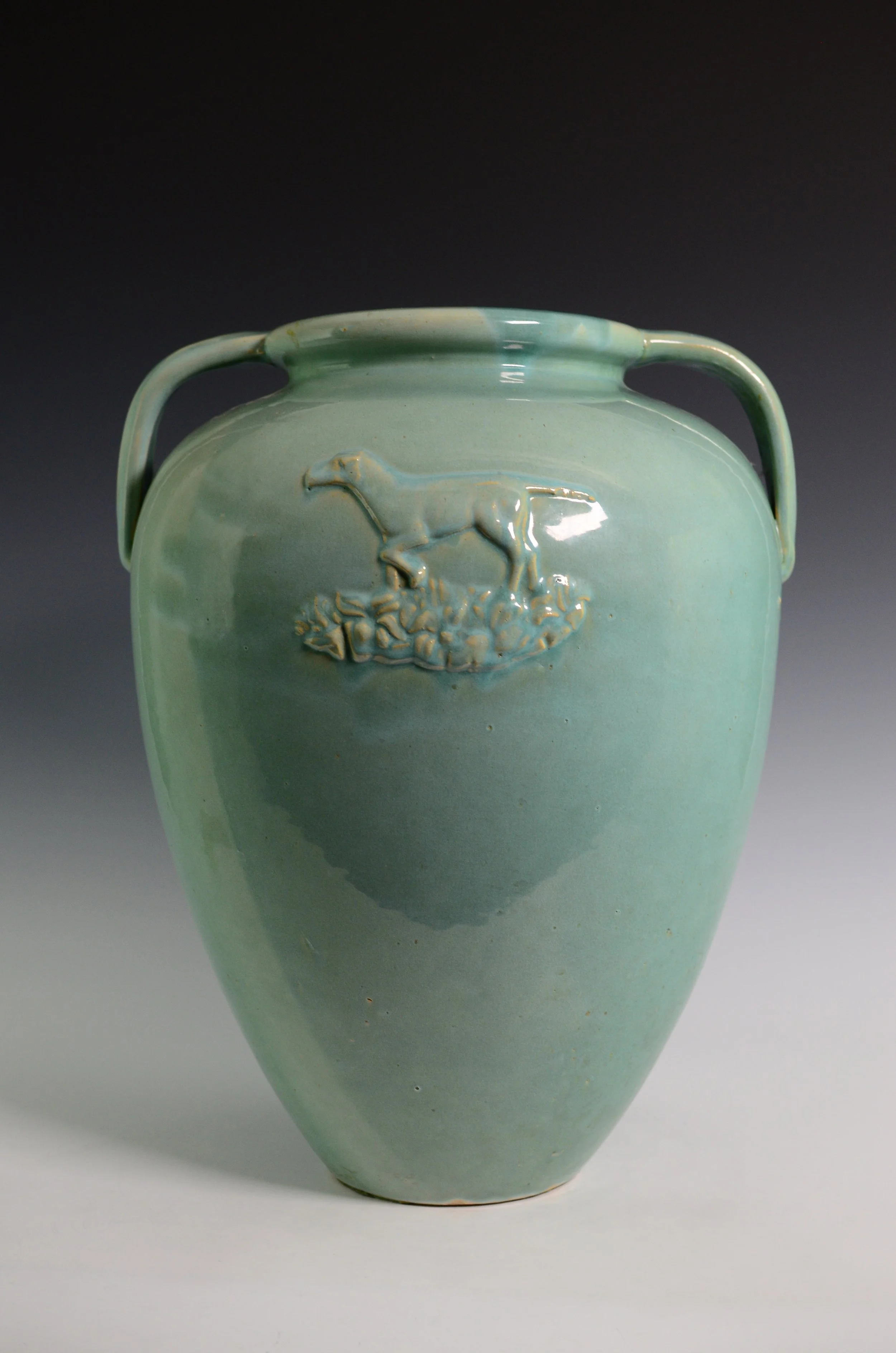 Burley Winter Pottery Company (1872-1988). Two-handled Floor Vase in Light Blue with Dog