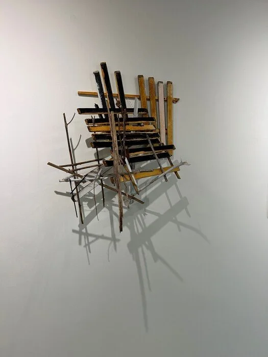 Tuck-Macalla Eric 3 Pallets and stacked chairs.jpg