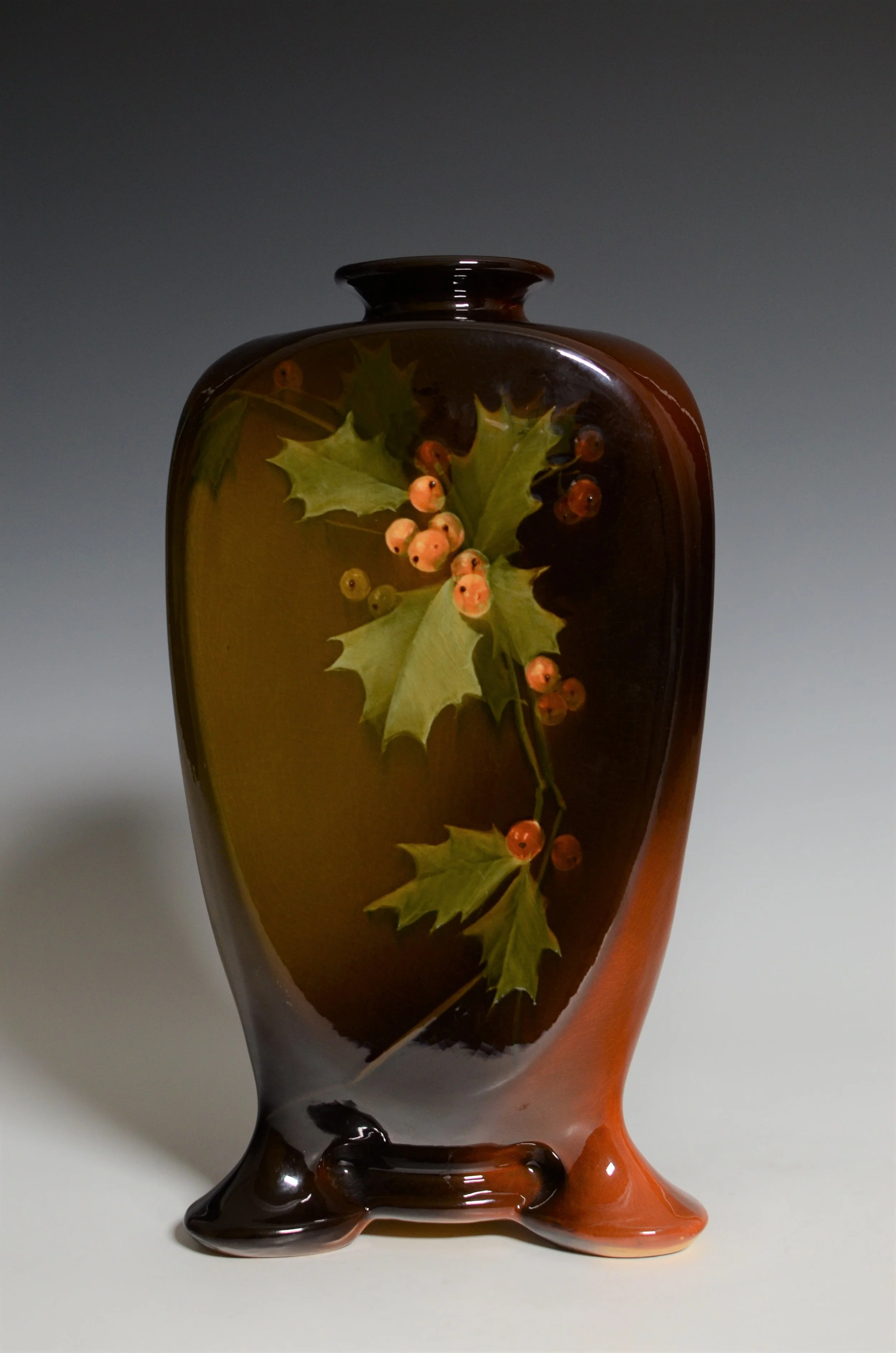 ZMA Puzzler! Louwelsa Three-Footed Vase Featuring Leaves and Berries by the Weller Pottery Company