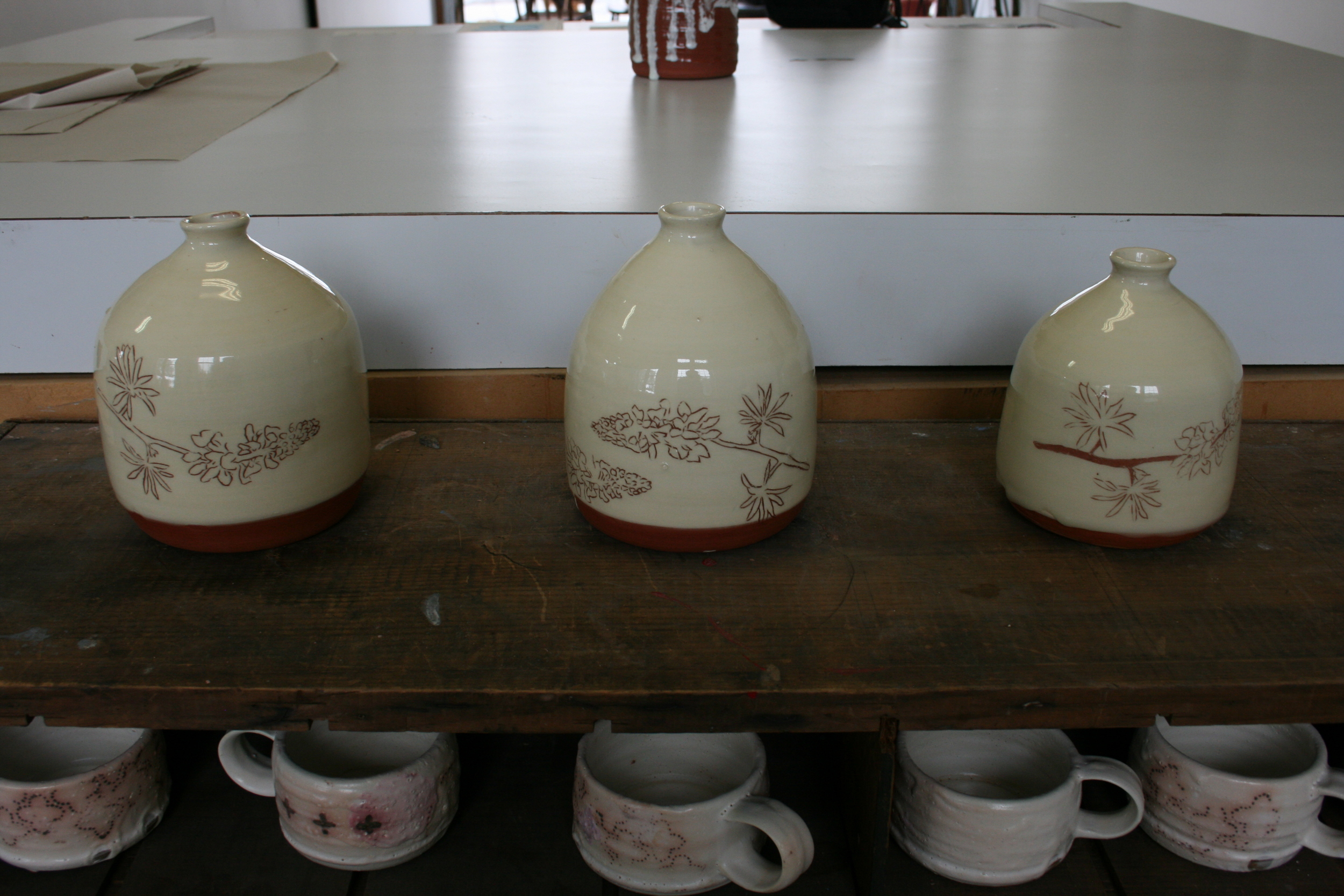 Erin and I's collaboration. Erin made these vessels and I draw the Lunenburg Lupines on them. 
