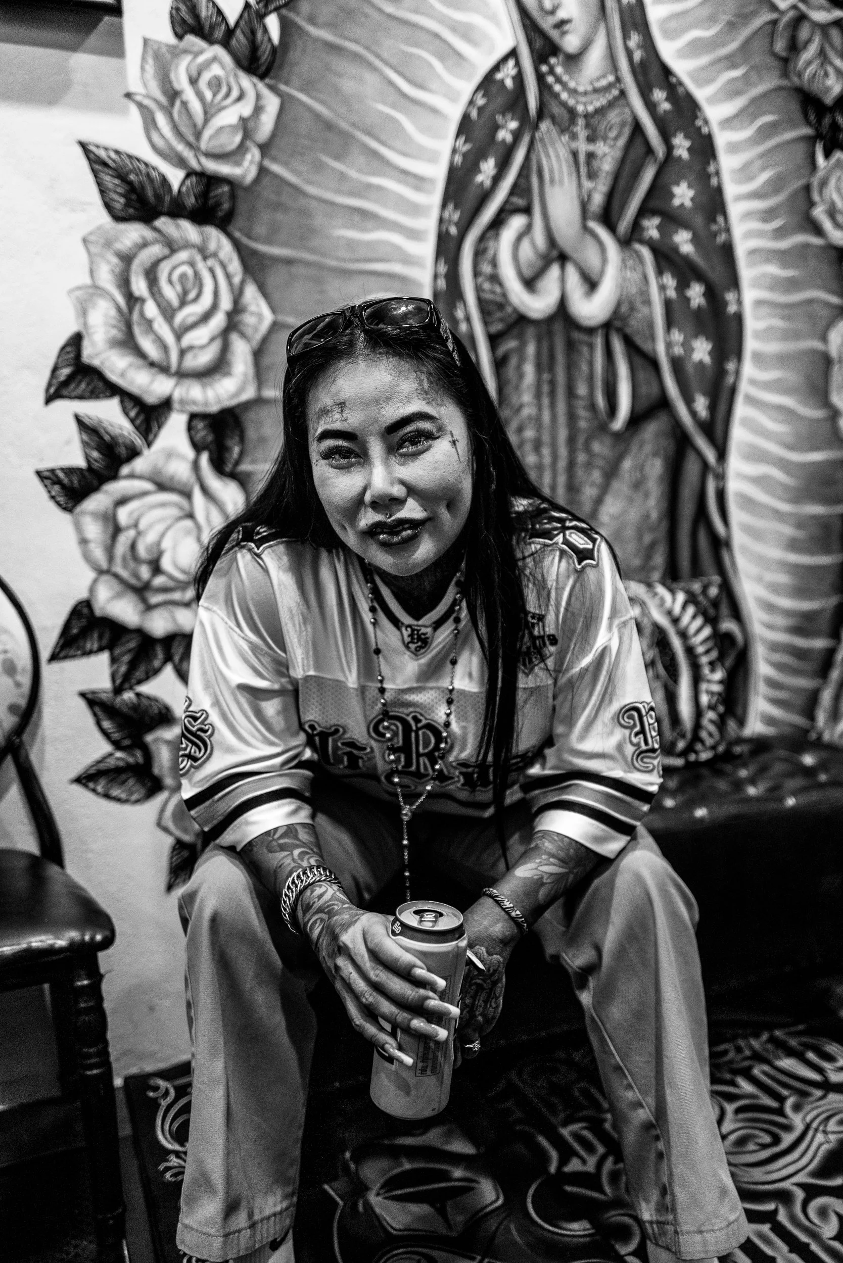 A seated portrait grounded in style, ease, and presence.