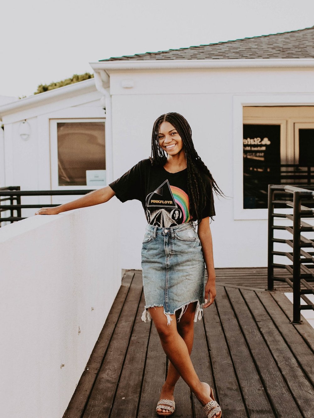 Denim skirt with band t-shirt // A Week Of 1970s-Inspired Outfits With Leah Thomas, The Sustainable Lifestyle Blogger Behind Green Girl Leah on The Good Trade
