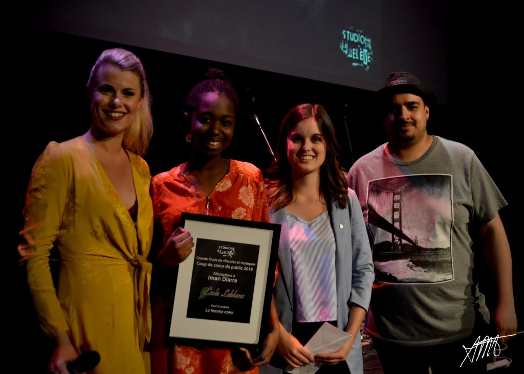 Iman Diarra, auteure du texte La femme Noire. Prix remis par Mme Alexanne Lafrance Lagault, représentante des caisses Desjardins St-Eustache - Deux-Montagnes et des Mille-Îles. Musique composée par Karim Médfaï