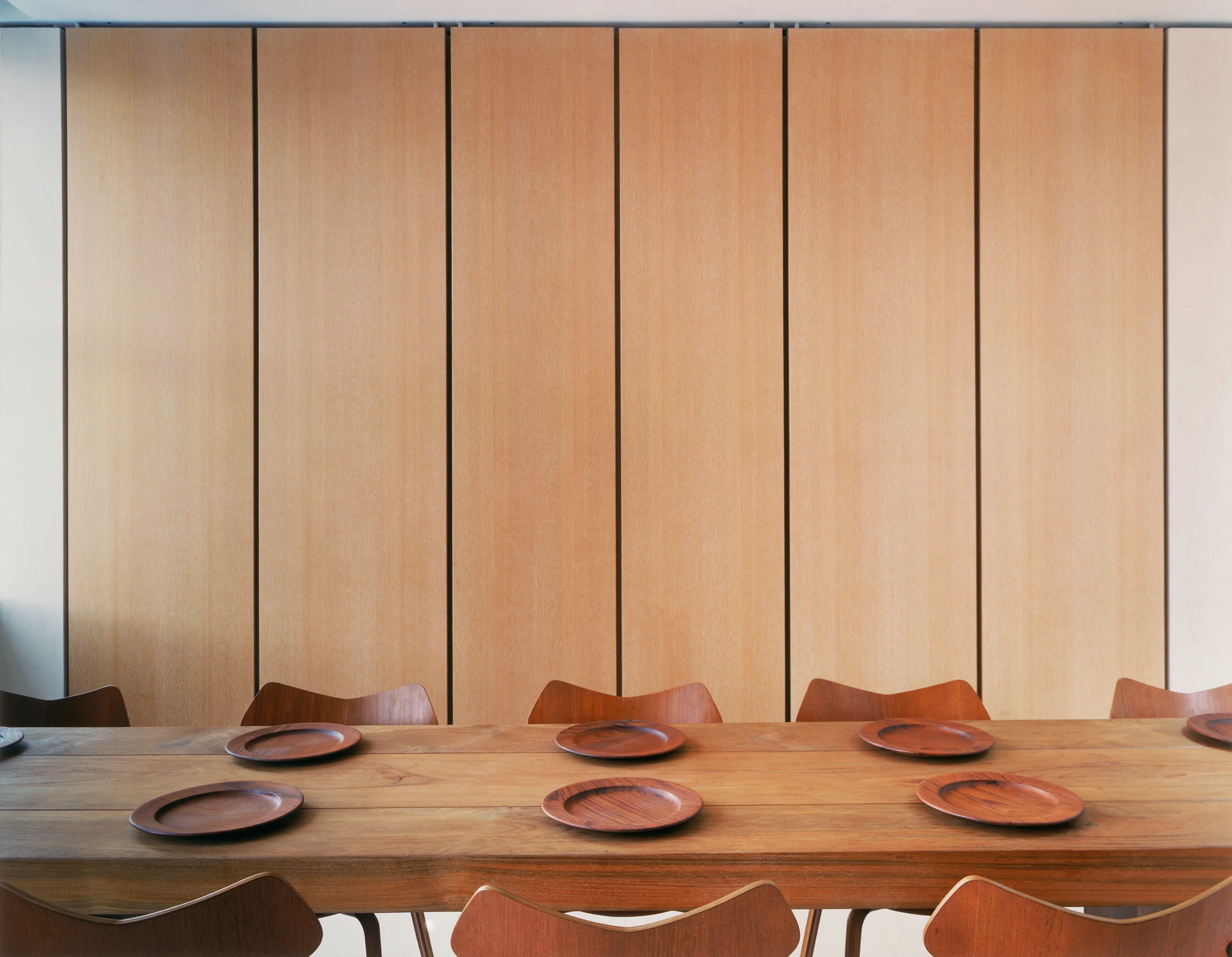 Teak table with Arne Jacobsen Grand Prix chairs