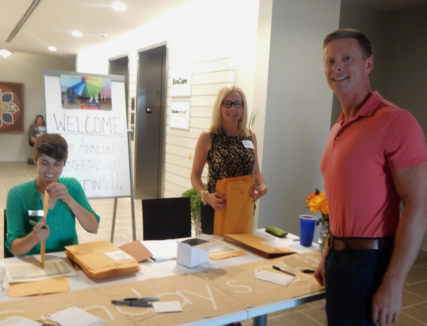 Board Members Sarah Humlie and Lauren Hayward greet Gary Rhodes