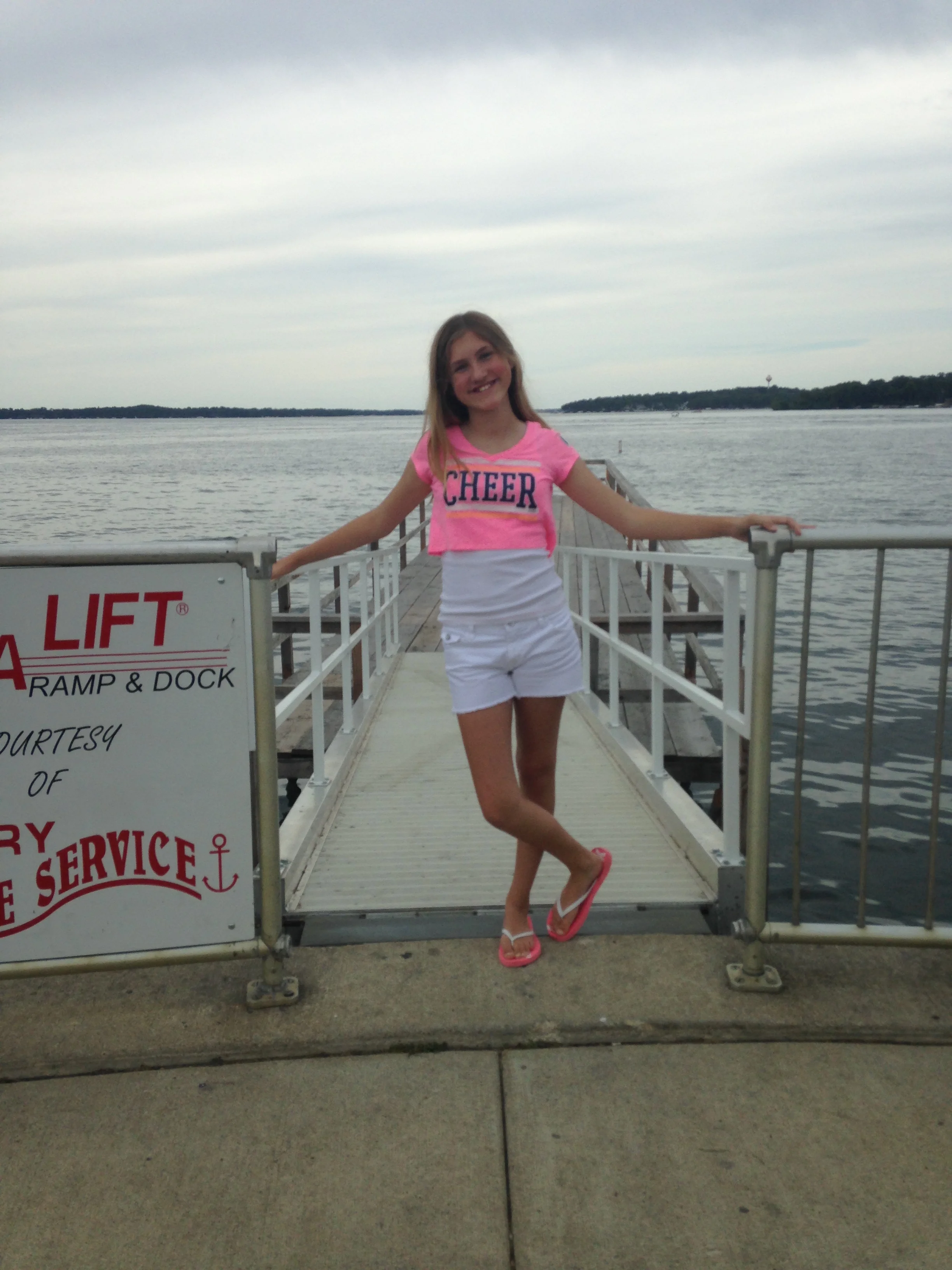 Ashlee-Headshot-On-Dock.jpg