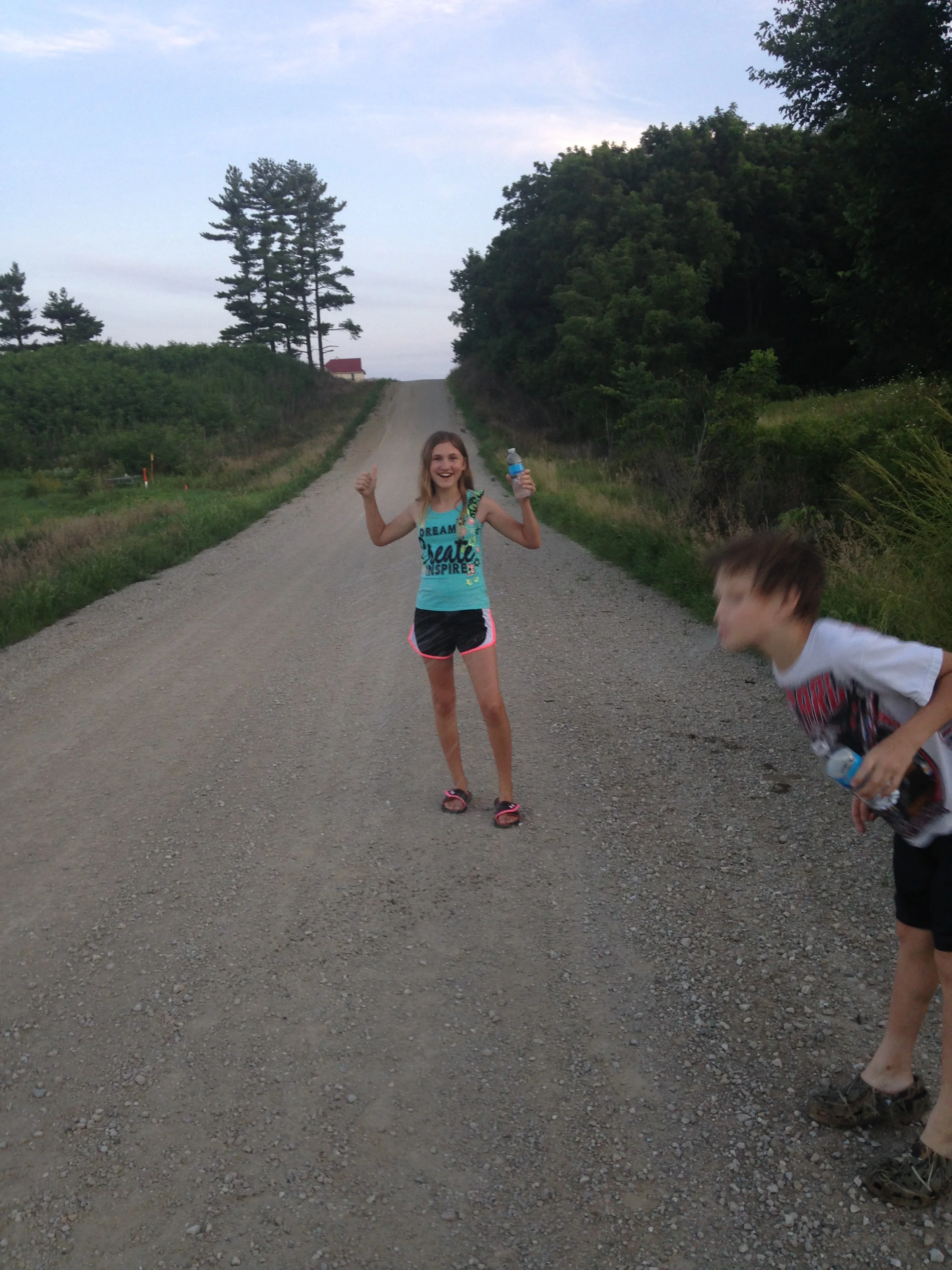Ashlee-and-Hunter-on-Road-Spitting-Water.jpg