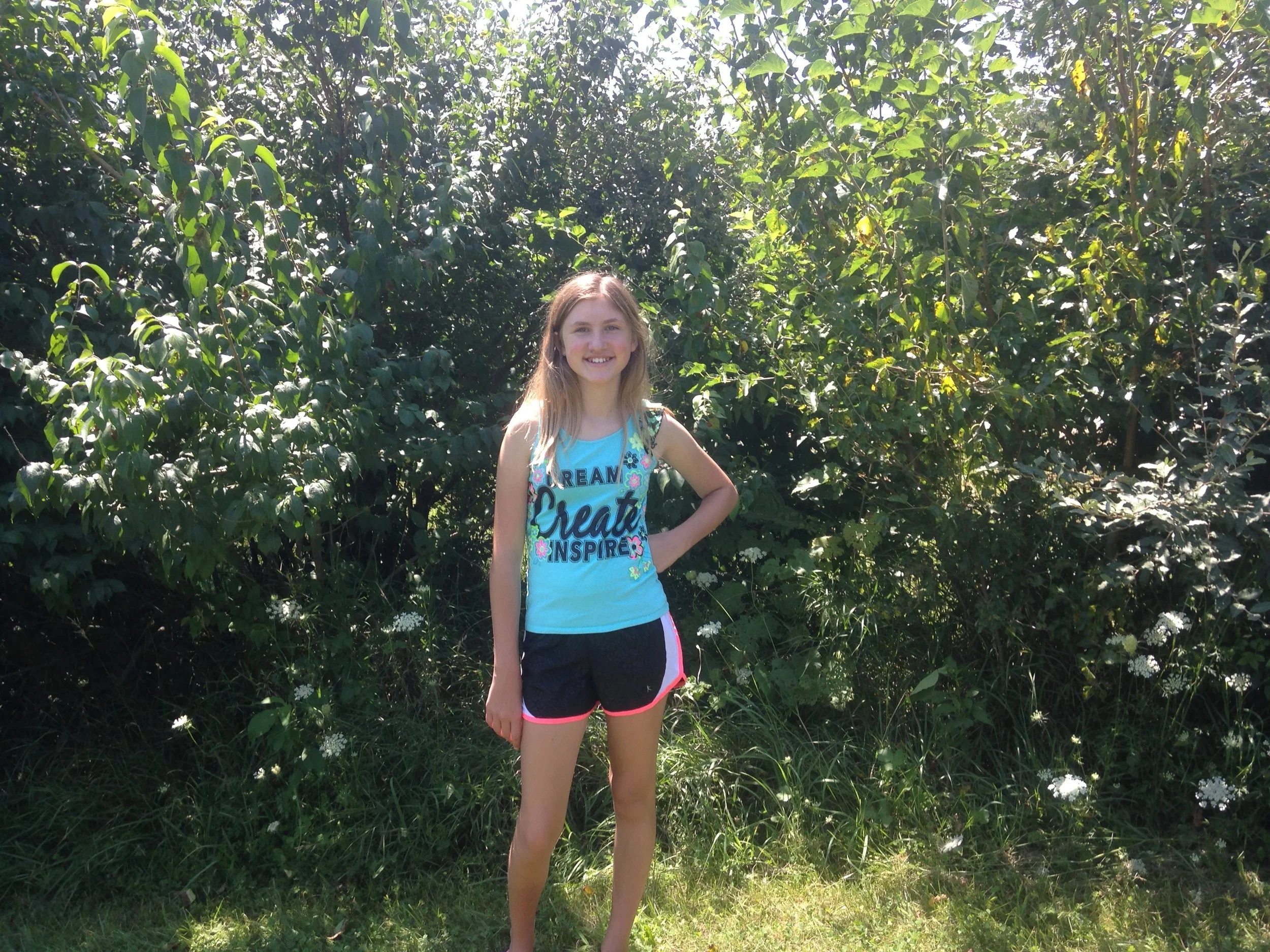 Ashlee-by-Flowers.jpg