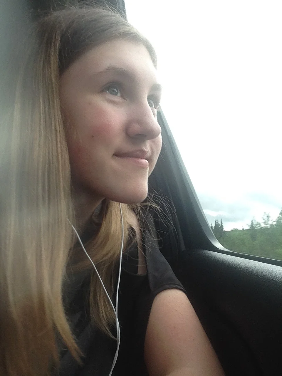 Ashlee-Looking-Out-Window-Canada-Trees.jpg
