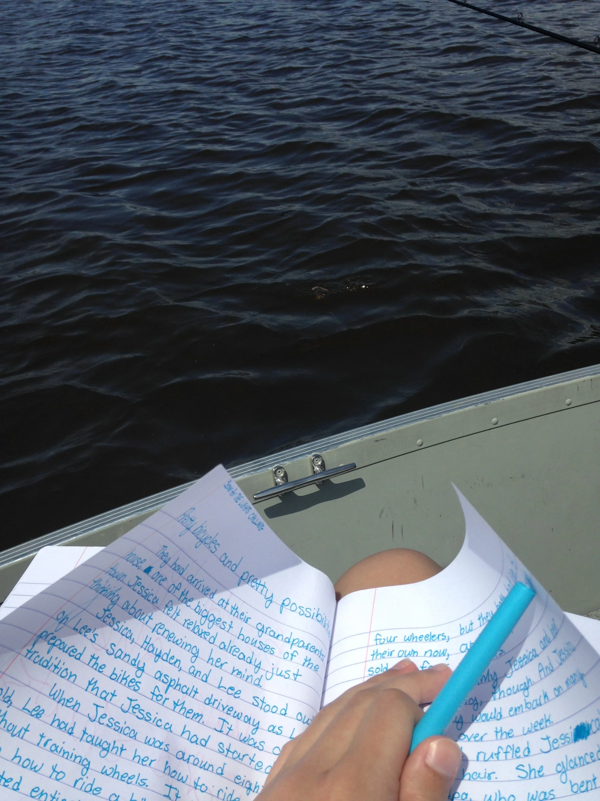 Ashlee-Writing-on-a-Boat.jpg