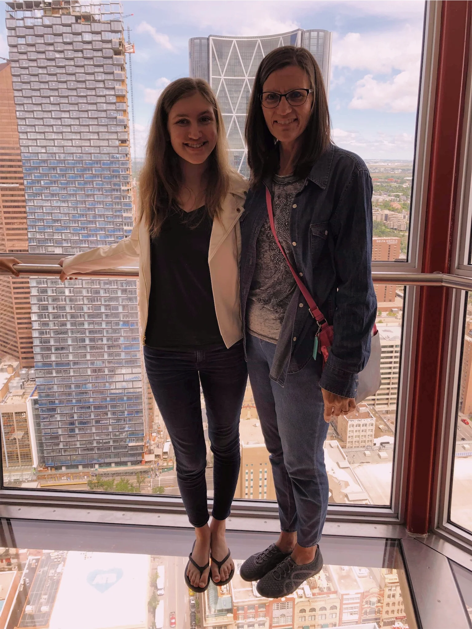 Ashlee and Mom in the Calgary Tower.jpg