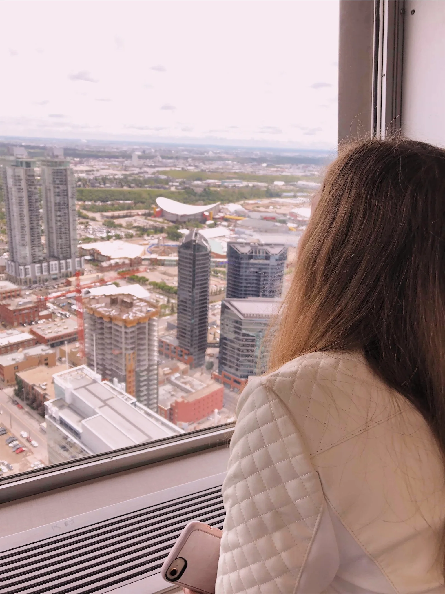 Ashlee looking at the Saddledome Calgary.jpg