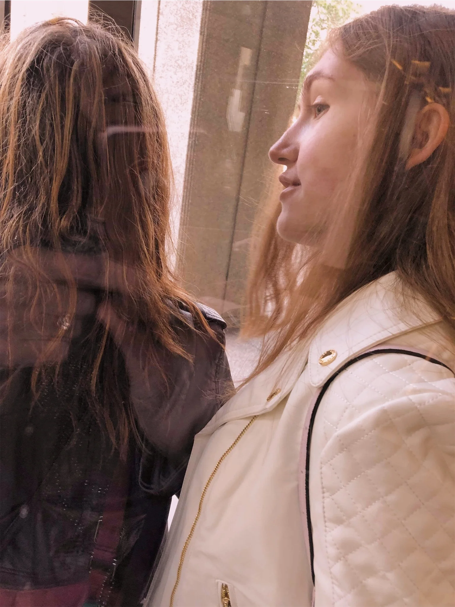 Ashlee and Kirsten in a revolving door Calgary.jpg