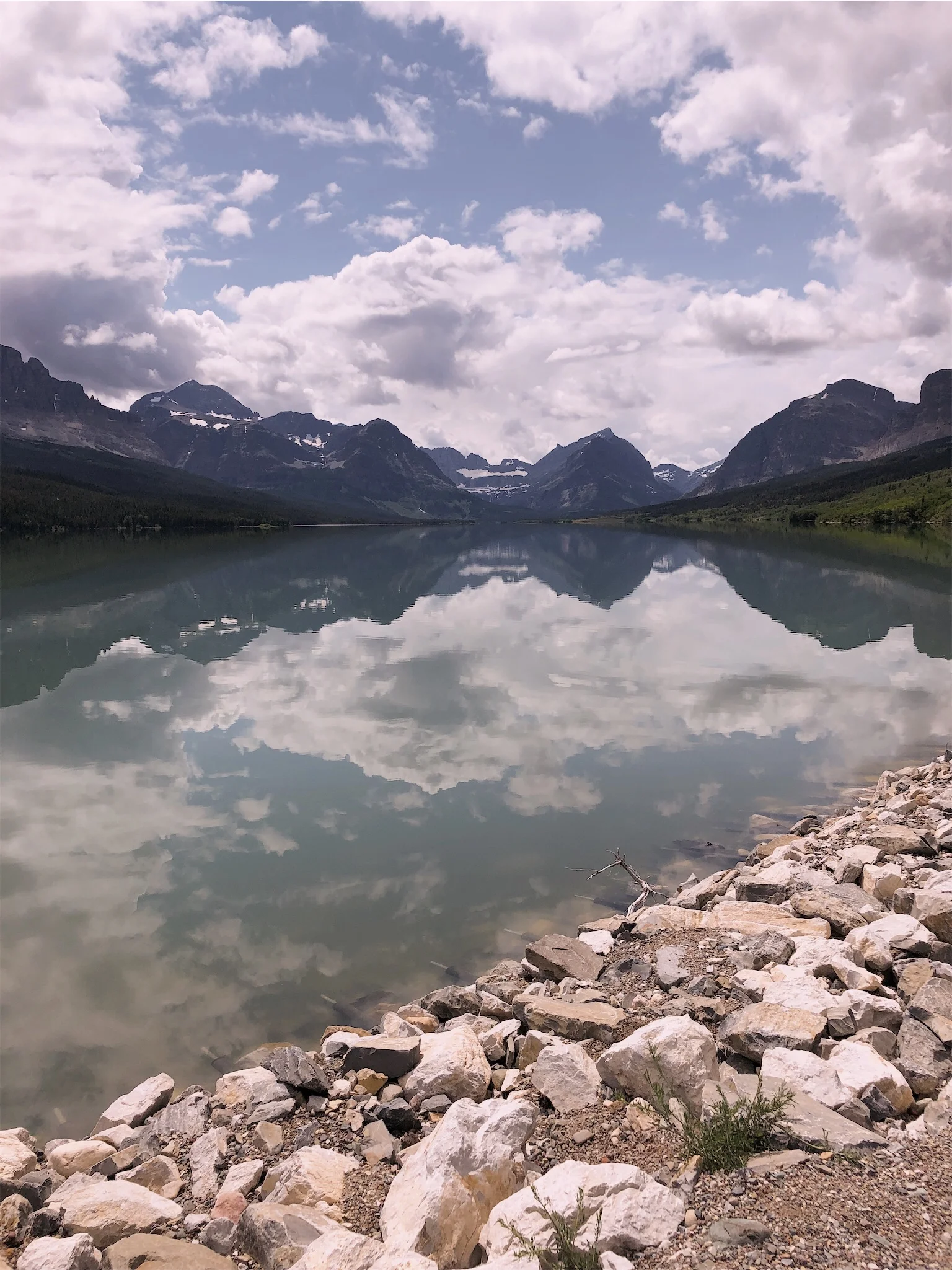 Glacier National Park clear blue lake.jpg