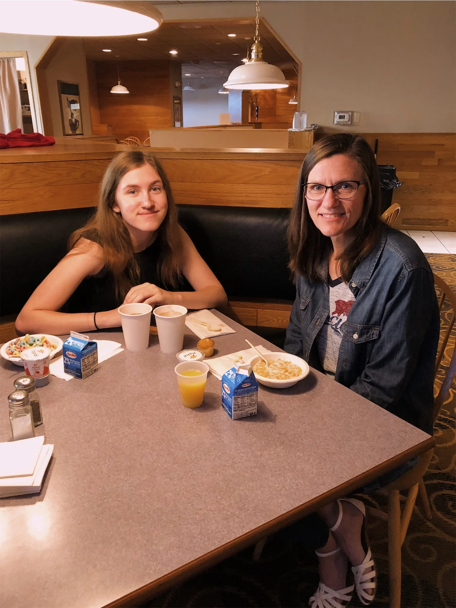 Ashlee and Mom eating breakfast at Bismarck hotel.jpg