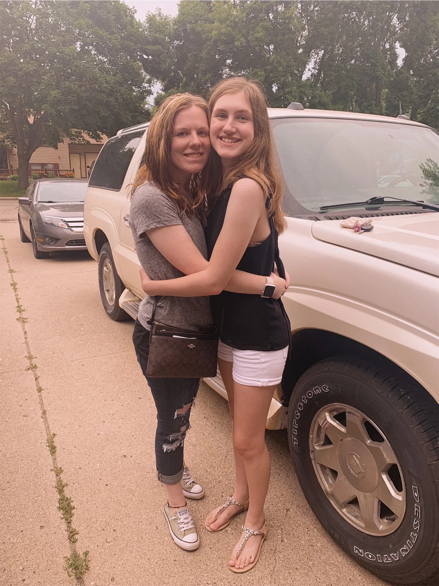 Ashlee and Kirsten hugging.jpg