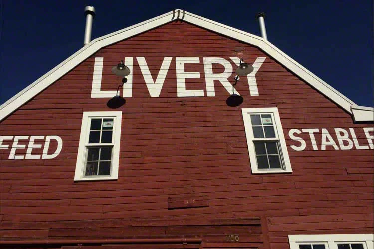 Going back a ways - adverts on a refurbished barn in Inglewood.