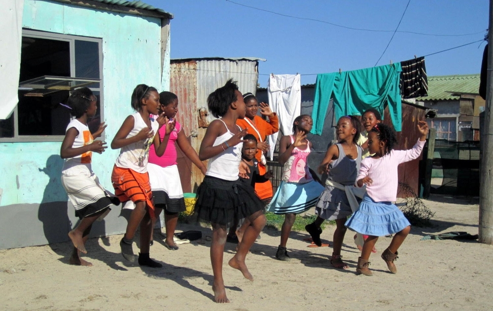 Copy of Girls in Khayelitsha, South Africa, dance at an open air campaign for an HIV support group