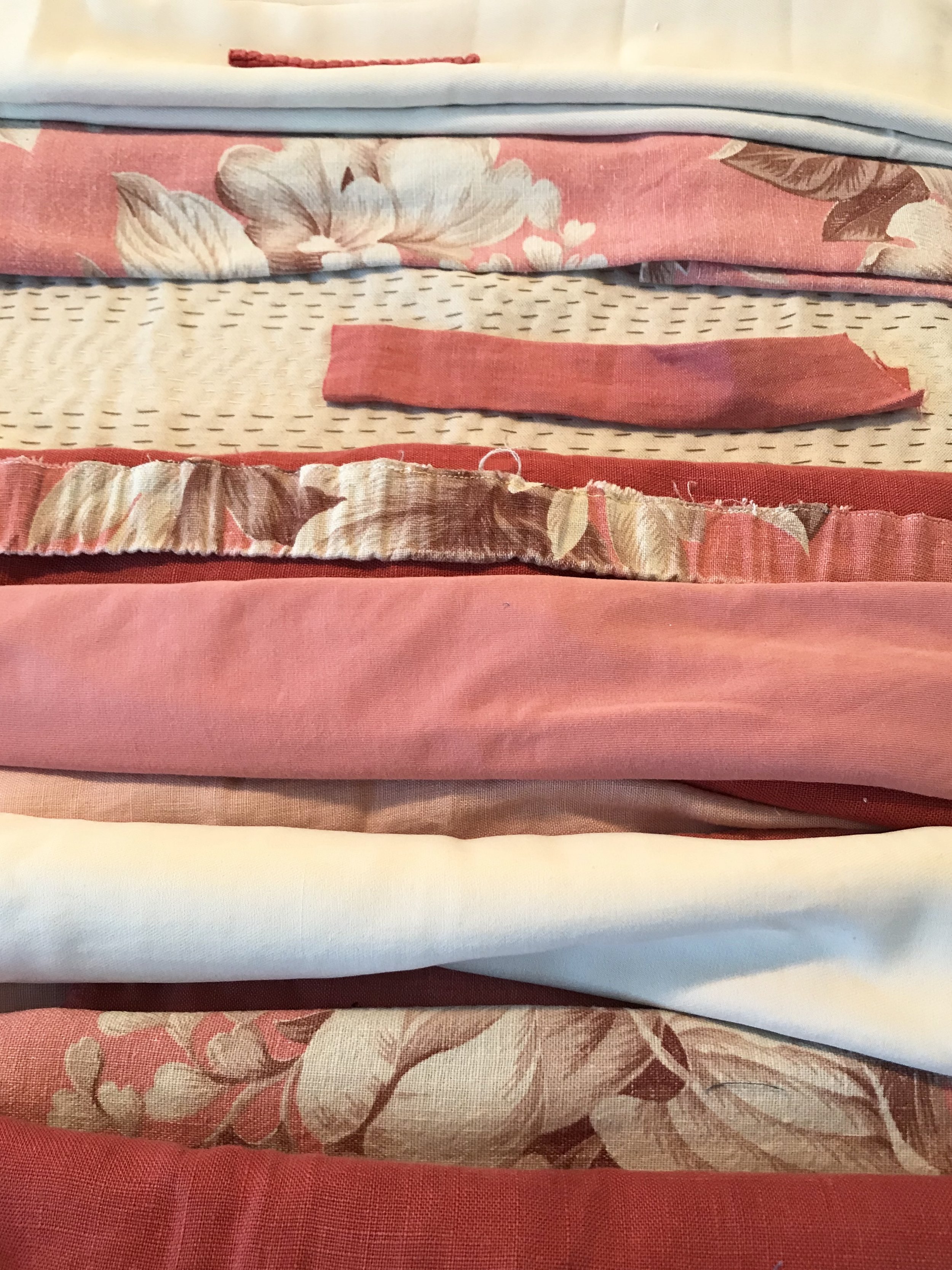 Repurposed fabrics I’m currently considering using for my second wall piece.
