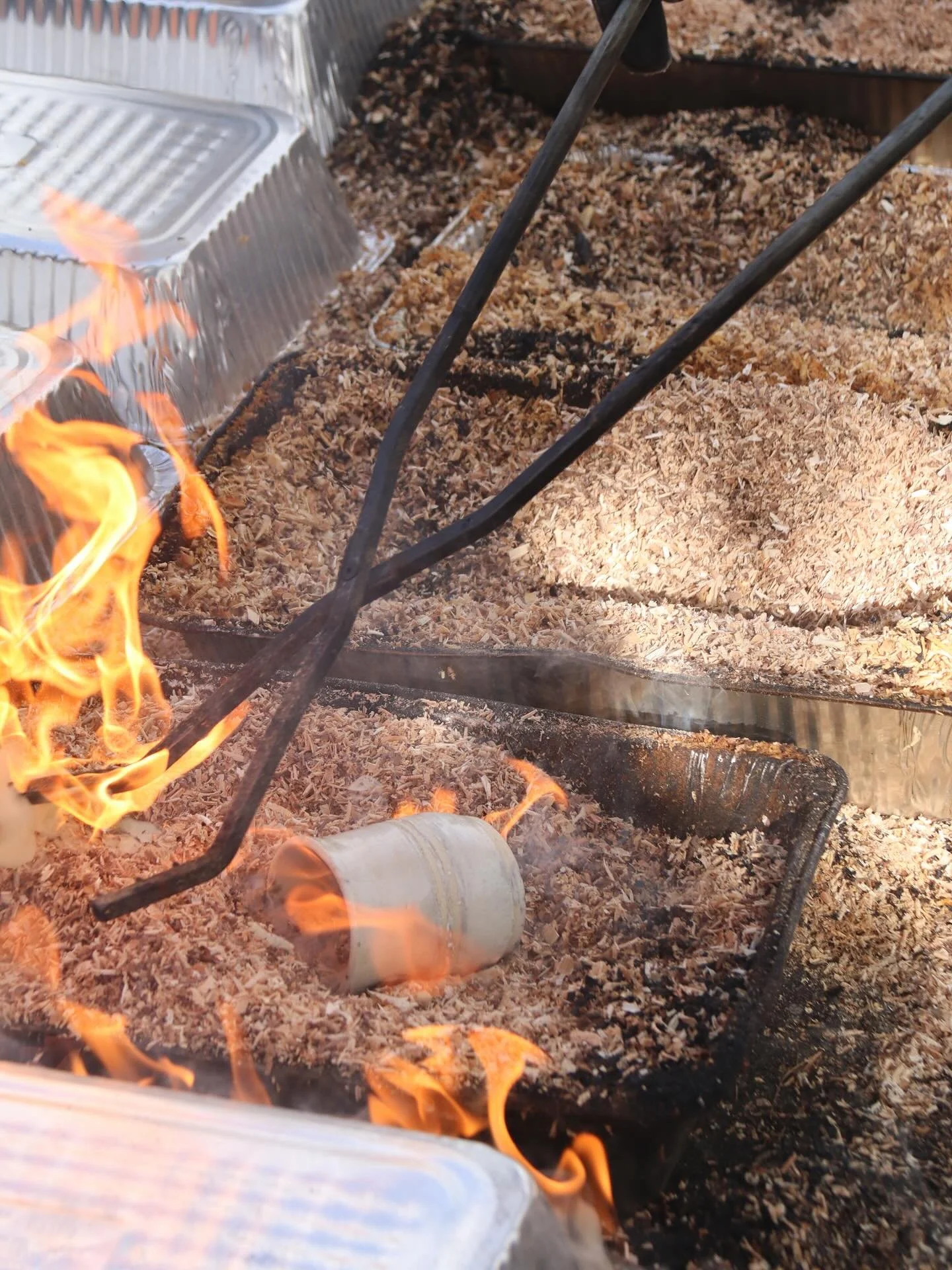 Raku fire day @clayspacetc was so much fun (if very Smokey ;)) I will post my results in a different post. Results are unpredictable and magical! 
From outside kiln to wood shavings, then cover and smolder/cool and then the shock of the water and the