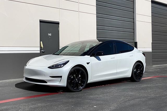 Unique Blackout Package and partial wrap on this Tesla! We wrapped the door handles in satin pearl white. For the upper part of the car, we covered it in Gloss Black.  While it was here, the windows were tinted in 20% @suntekfilms Ceramic Film.  We&r