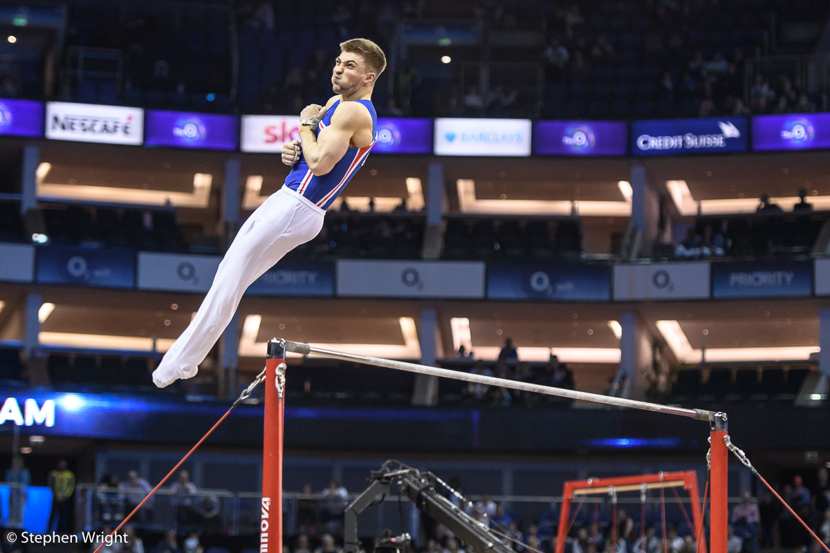 Sam Oldham nailing the dismount from the High Bar at the World Cup of Gymnastics at the O2 , London.