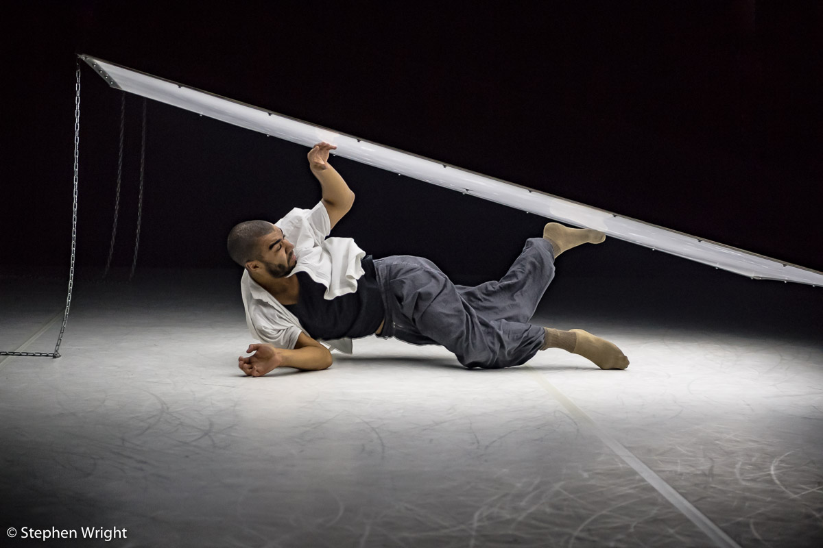 Louis Parker-Evans of 2Faced Dance Company performing From Above , choreographed by Tamsin Fitzgerald and performed at The Place, London .