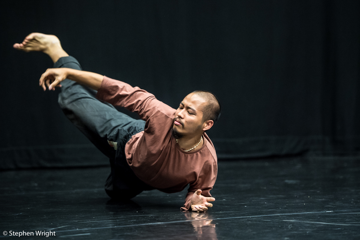 James Gallego Olivo peforming Lewis Cooke 's work-in-progress during the Sadler's Wells Young Associates Summer School .