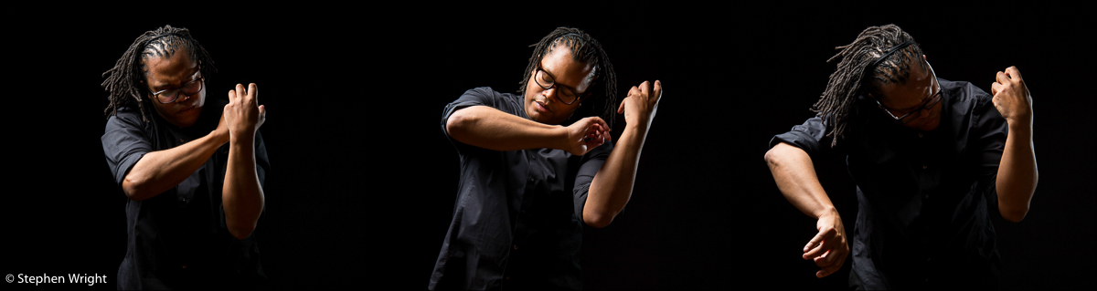 Classical musician Clifton Harrison on-set during a movement sequence.