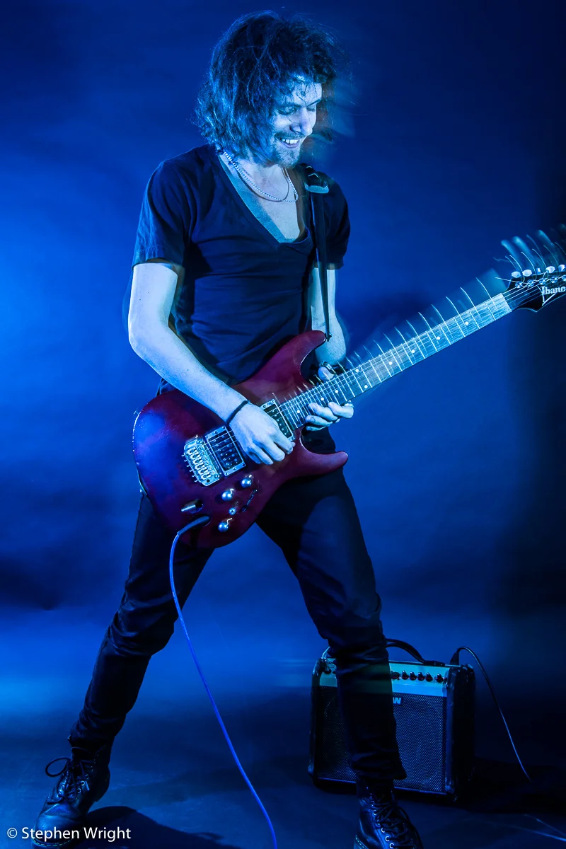 Musician Alex Paton on set during his portrait session.