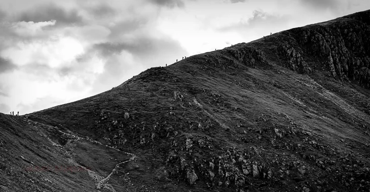 Sheer scale and the looming storm had put me off but seeing so many people at the second peak I could not resist.