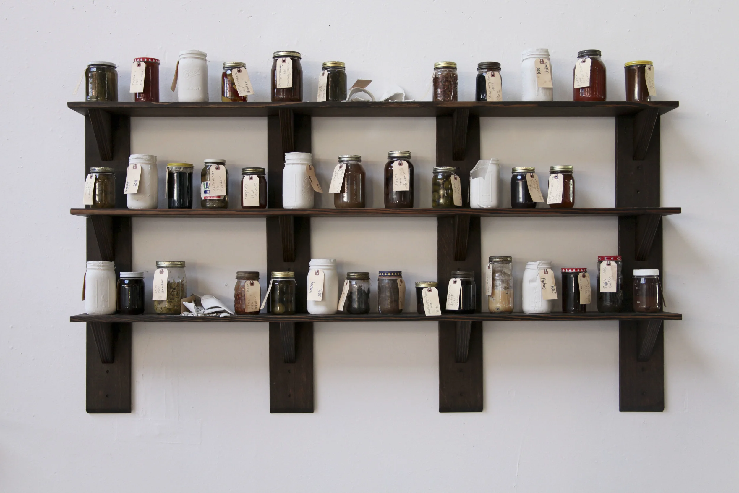 Way Back on the Shelf explores the autobiographical memory of the artist through sculpture, installation, and video performance.