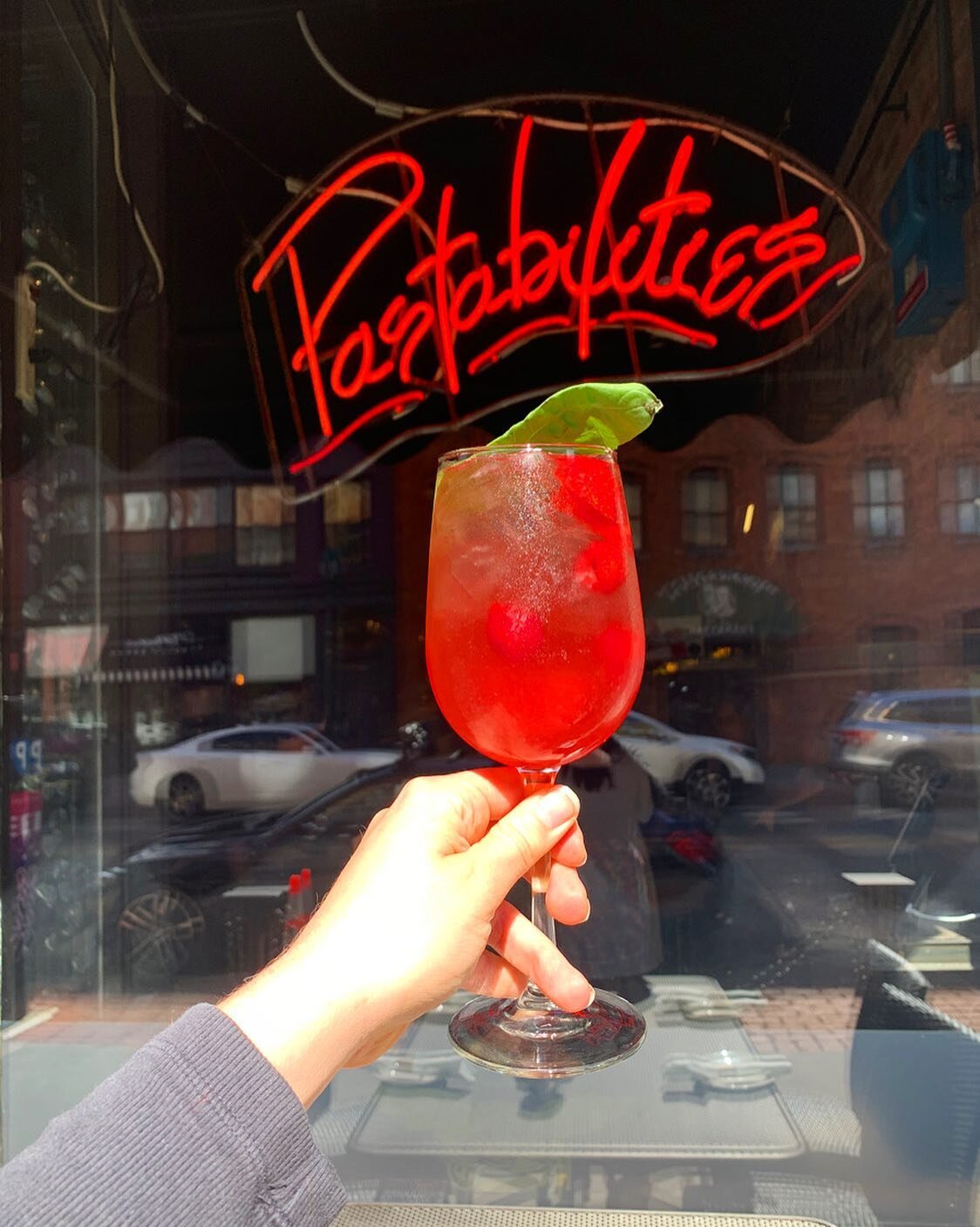cheers to the sunshine and this beautiful ROSE SANGRIA ✨ 🍓 
.
.
rose, strawberry, raspberry, orange, basil, pink peppercorn, cocci rosa, topped with sparkling rose 
.
.
#rose #sangria #pastabilities #syracuse #wednesday #sunnyday #courtyard #dinner 