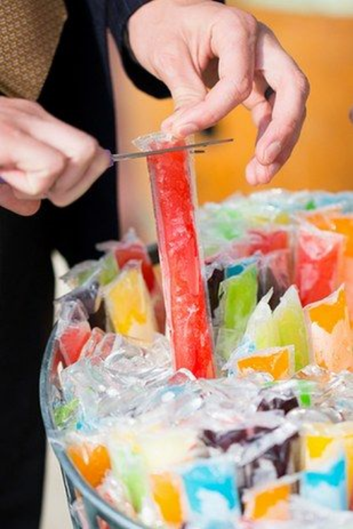 Who doesn't love ice pops!? Not only are they a cheap and easy treat, they are super colorful to go with the theme of your party! 