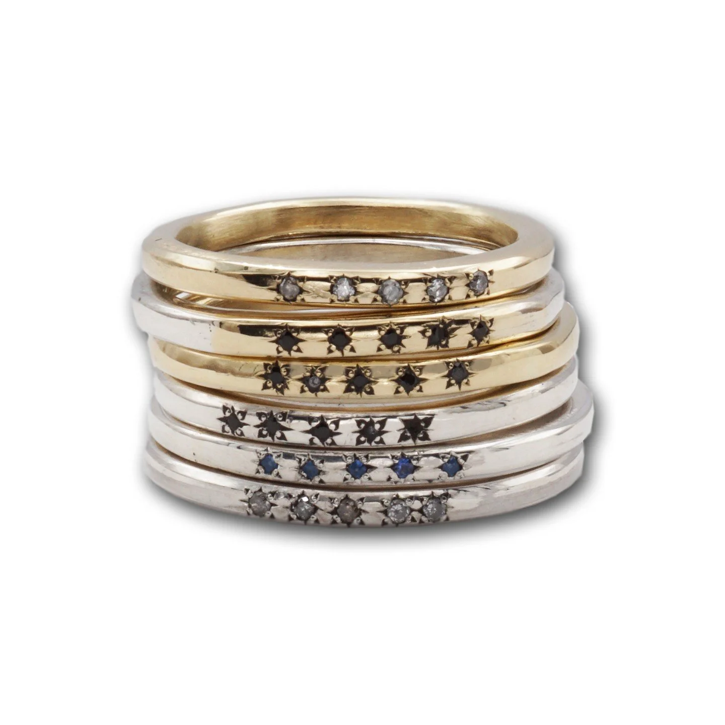 The cutest little stackers, part of the new Suave collection. After spending a month binge watching Madmen, here we have the Joan (solid 14k), the Peggy (mixed metal 14k and silver), and the Betty (silver).

All are available in salt and pepper diamo