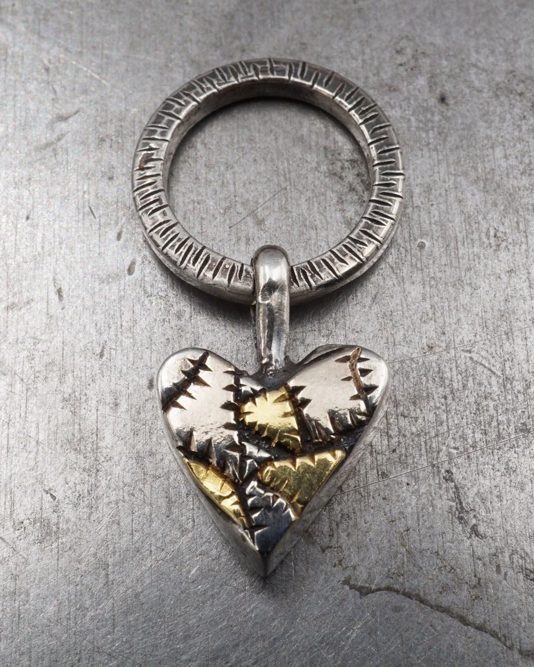 While working thru some things and engaging in wanton experimentation this spring, I made a small &quot;Mended Heart&quot; series. It is inspired by the humans that put you back together when all else fails, those that stitch you back up, slap you on