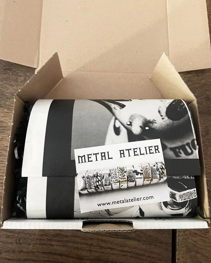 If you order any Metal Atelier jewelry with an  obscenity on it, the packaging matches! Also available  for any non-obscene order by special request 😉 

Regular non obscene jewelry = black tissue paper