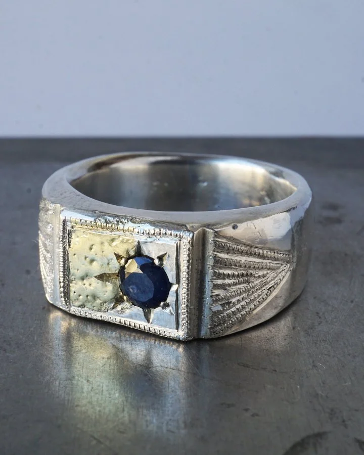 Love has been in the air at the atelier!

D. saw a sample ring I had posted and inquired about having the ring remade as his wedding ring... wedding rings don't have to be bands, they can be whatever you want them to be, of course. 

We changed the s