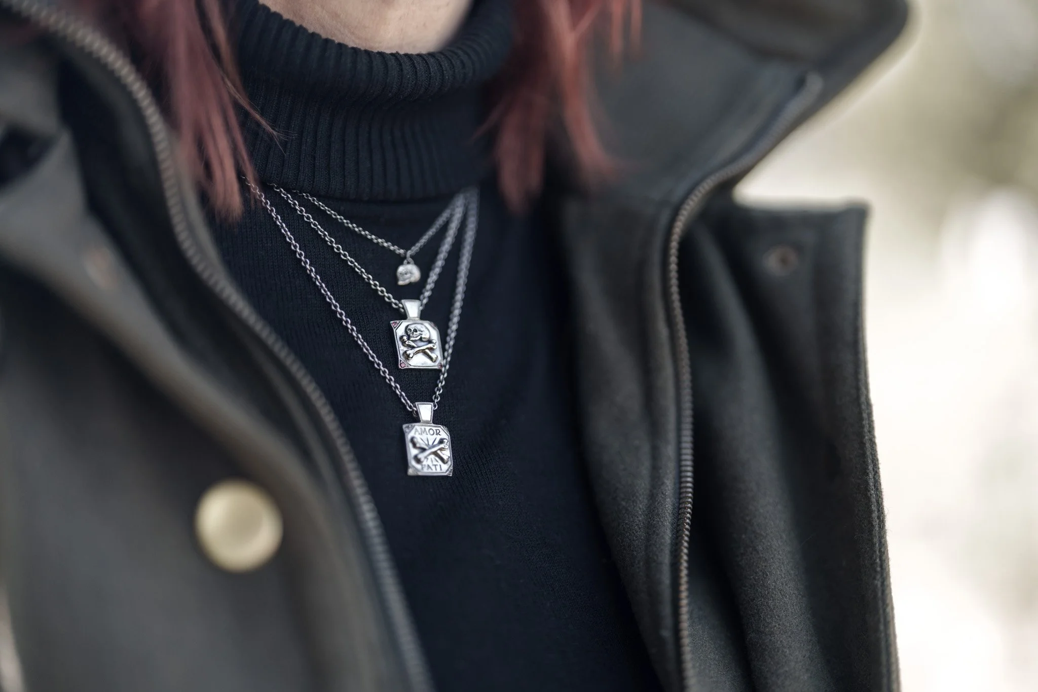Metal Atelier silver skull and memento mori pendants worn by DJ Sindi Halfrats 