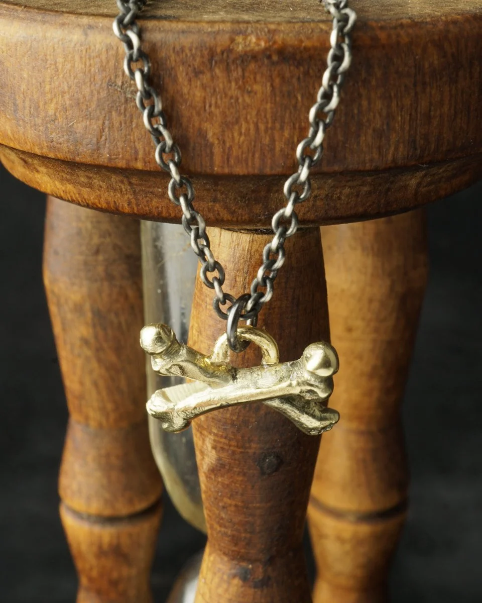 pendant_goldbone_hourglass.jpg