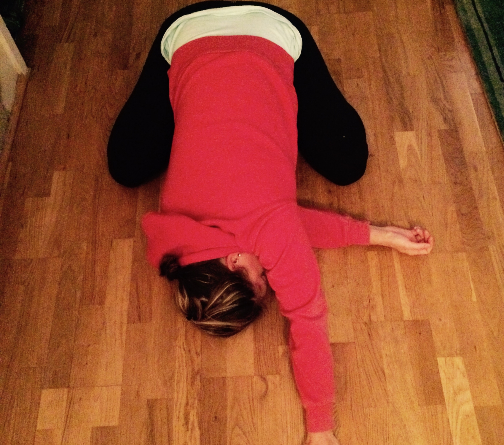 This one is a little variation on the typical child's pose you may have done in the gym or in a yoga class. I like it because it stretches my hips and legs but I also get a low key spinal twist in there. From hands and knees shift your weight back towards your feet so that you come to sit on your heels with your big toes touching and your knees wide. Walk your arms out long in front of you. Take your right arm and thread it through under your left. Bring your head down onto the floor, or a pillow, so that your right temple is making contact. Take a load off and just chill for awhile before switching sides. 
