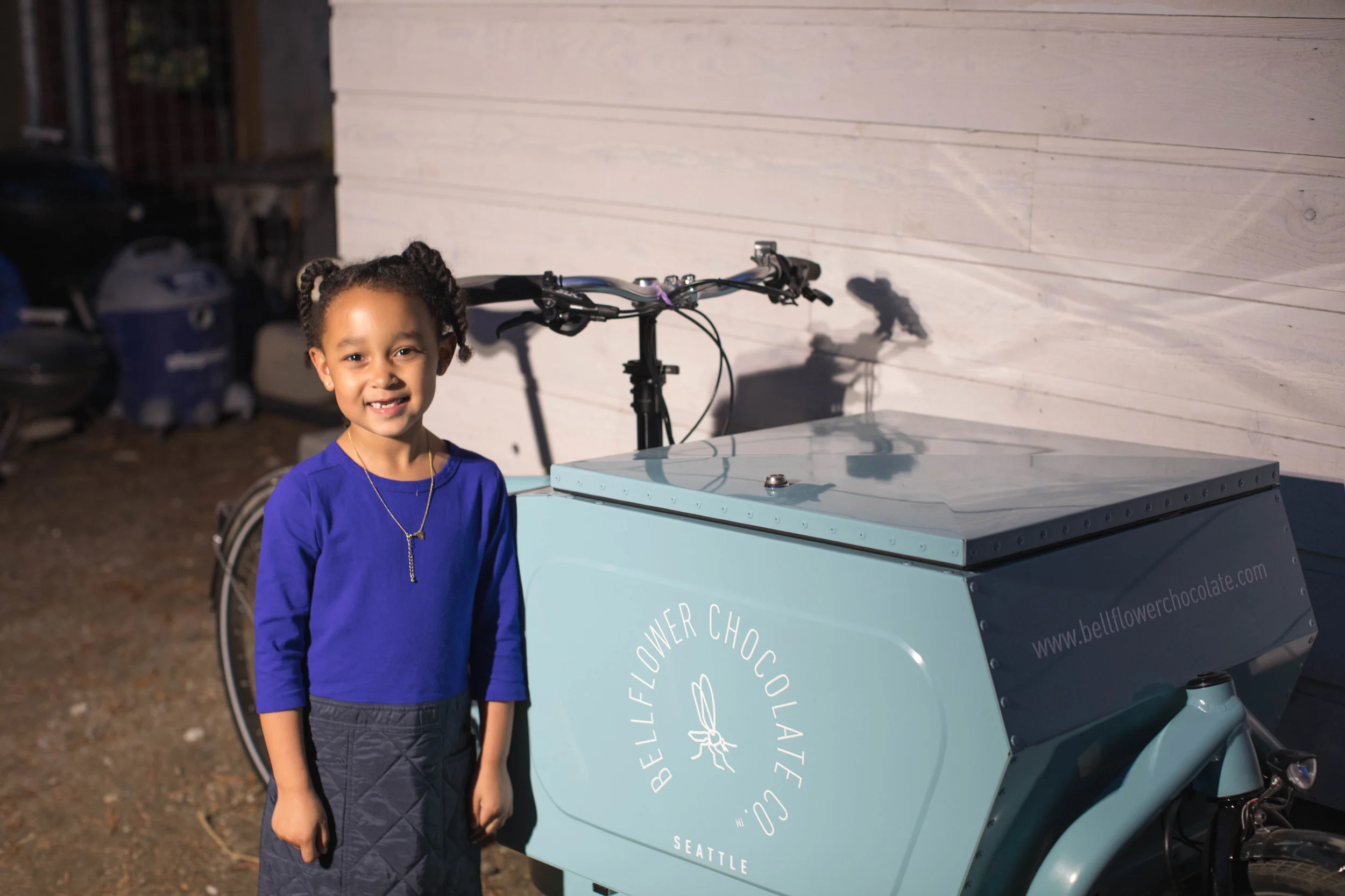Bria in front of The Chocolate Bike™.